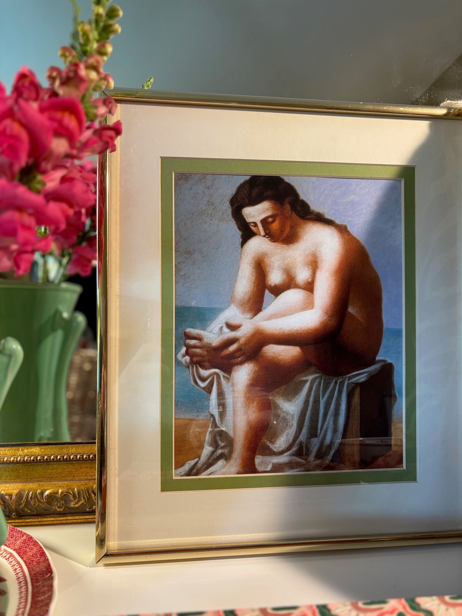 Curated vintage art in modern frame